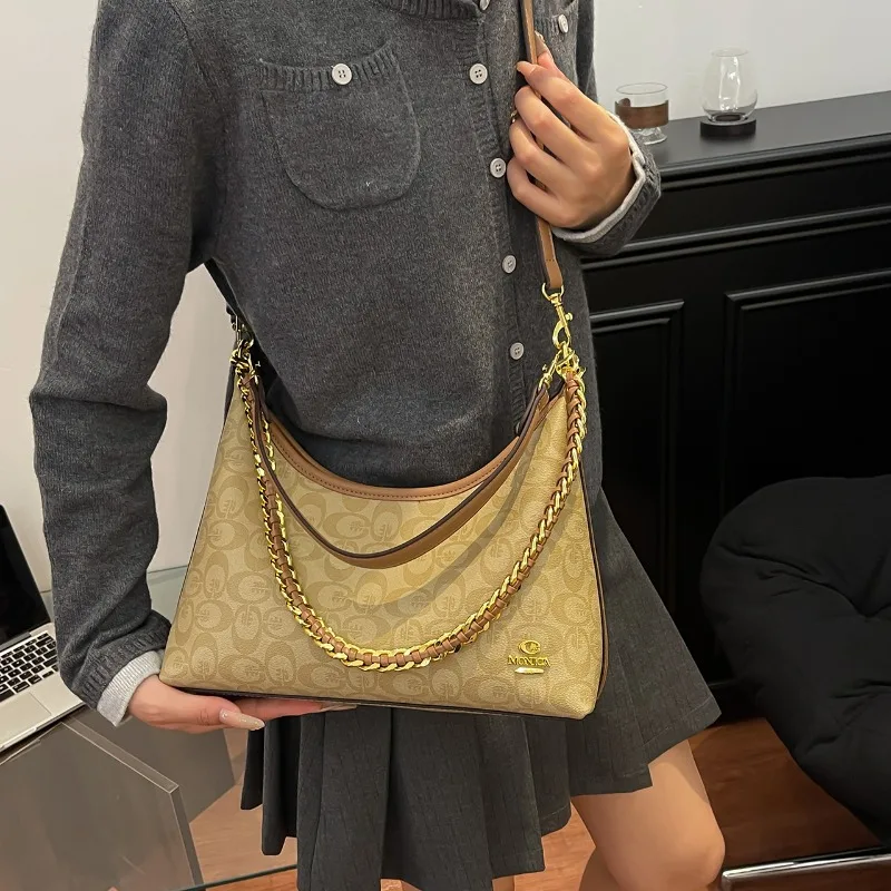 

Avant Garde Colorblock Tote with Contrast Stitch Detailing and Rotating Hardware for Corporate Transit Exuding Architectural