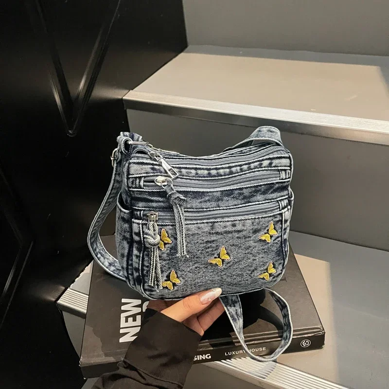 

Fashion Zipper Solid Denim Commuter Youth Women's Shoulder Bag 2026 Hot Sale Trendy Butterfly Embroidered Stylish Crossbody Bags
