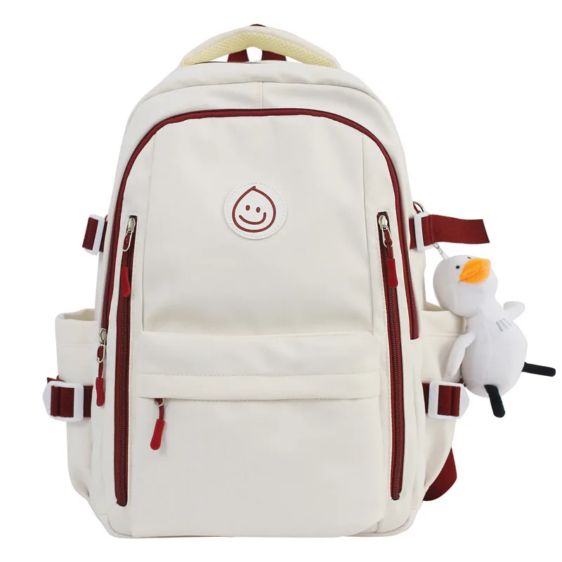 Mochila escolar de lona para mujer, morral bonito de color blanco, impermeable, de nailon, a la moda