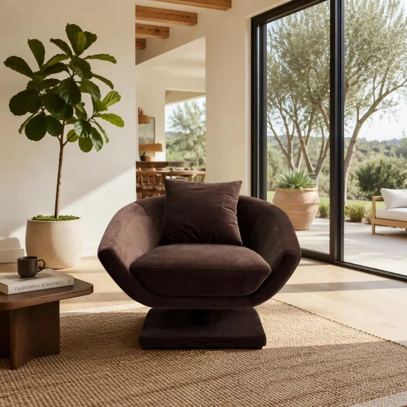 Brown velvet lounge chair with sculptural shell seat base and armrests