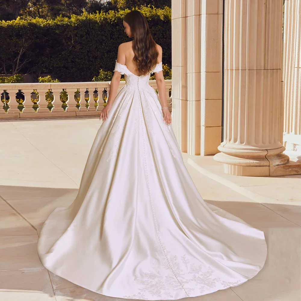 ロマンチックな A ラインのウェディングドレス大きく開いた恋人ネックアップリケカスタマイズされたブライダル成長オフショルダースリーブ Vestidos De Novia