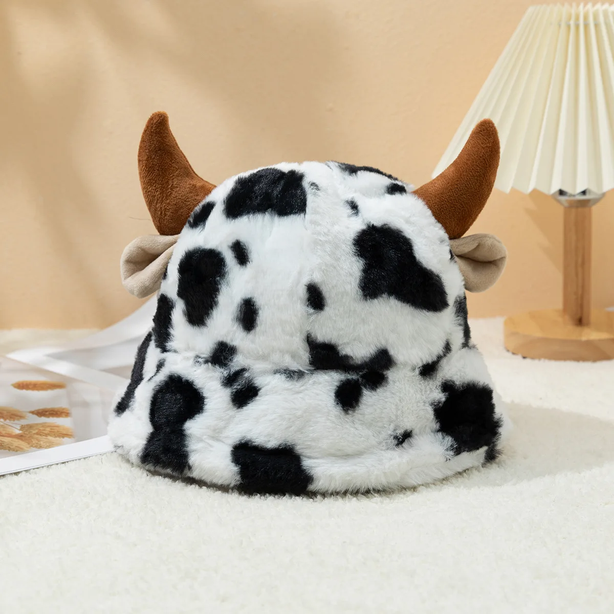 One piece of women's cute cow-print horn-shaped fisherman hat, autumn and winter warm, cold-proof and wind-proof bucket hat