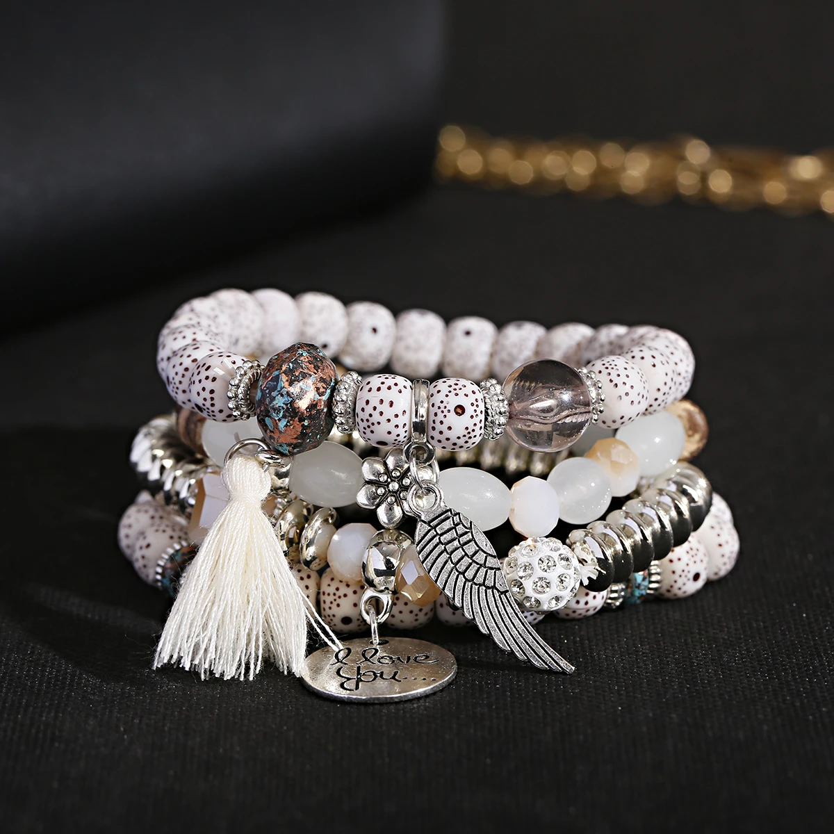 Nouveau bohème perles blanches gland Bracelets ensemble femmes pierre de lave naturelle alliage aile pendentif bracelet à breloques Boho bijoux