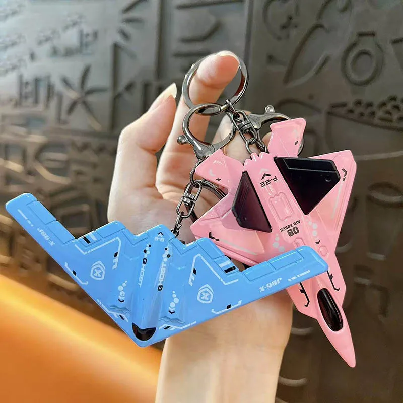 Mini avión de aleación creativa/juguete de combate, llavero modelo para niños, regalo de luchador para niños, colgante de avión pequeño de inercia