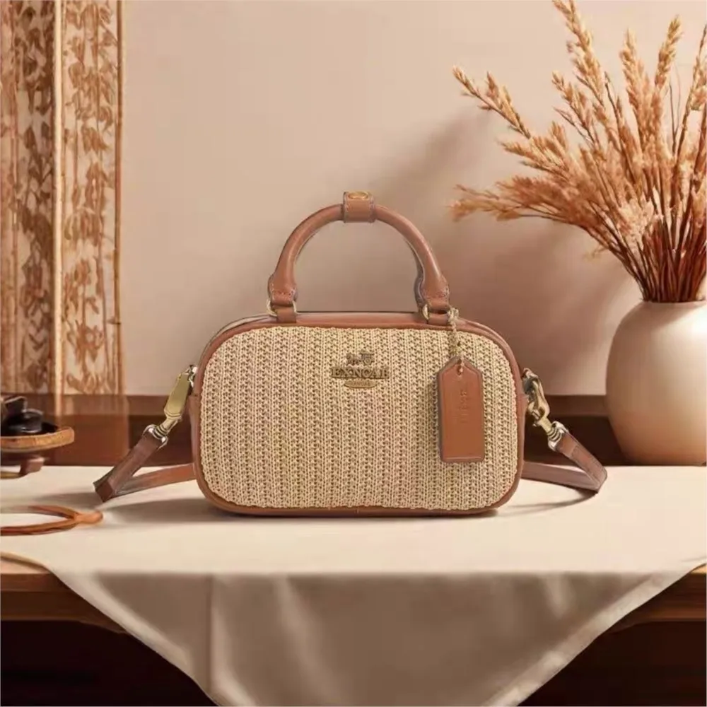

Small niche design grass woven bag for women 2025 new summer versatile crossbody bag, hand-held bowling bag