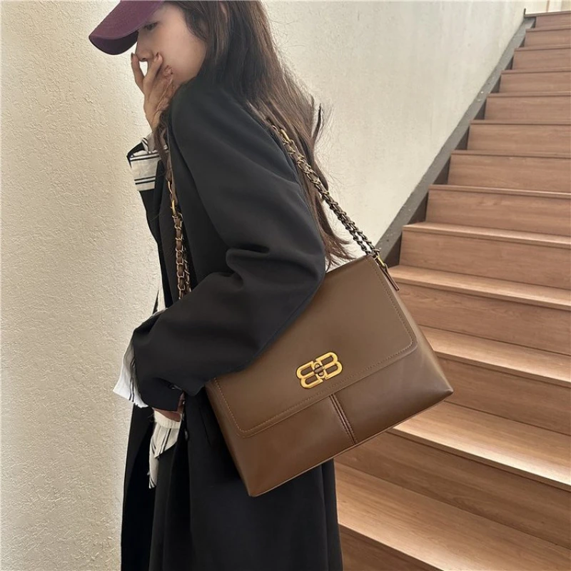 

women pu leather retro shoulder bag with buckle closure stitched detail 2025 spring work office commute bag