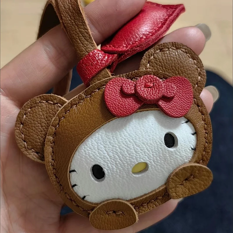 

Hot Kawaii Handmade Leather Goods Sheep Cross Dressing Hello Kitty Handbag Pendant Cute Car Keychain Toys Girl Birthday Gifts