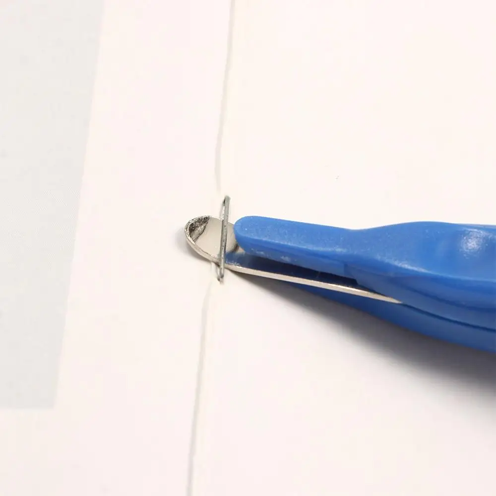 Tipo di penna portatile Meno sforzo Testa magnetica Forniture per rilegatura portatili Rimozione punti metallici Strumento per la rimozione delle punti Estrattore estraibile