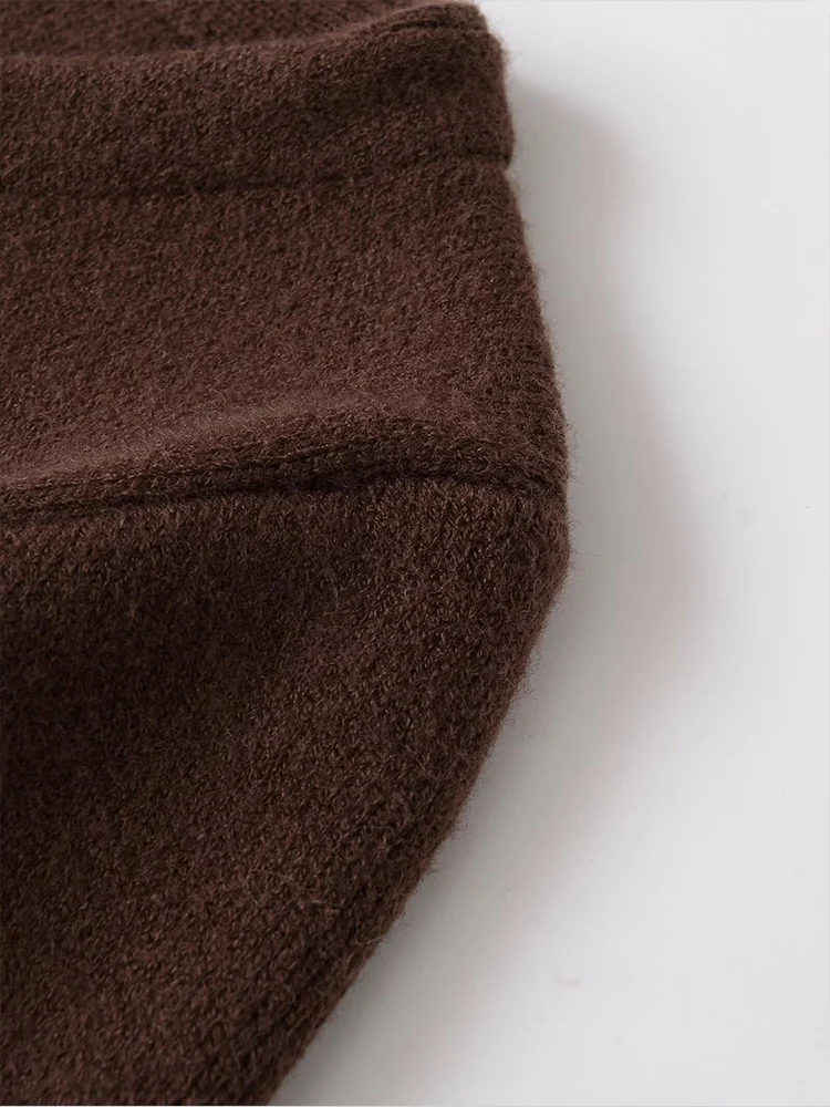 Kardigan rajutan patchwork efek bulu imitasi warna solid yang modis dan serbaguna bergaya Eropa untuk wanita.