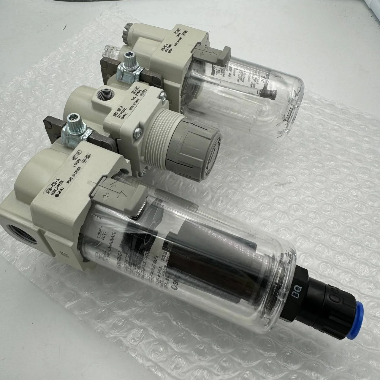 فلتر هواء SMC أصلي، صمام تخفيض الضغط، بخاخ رذاذ الزيت AC25-02G/DG-A AC25B-02DE-B عنصر ترشيح الهواء