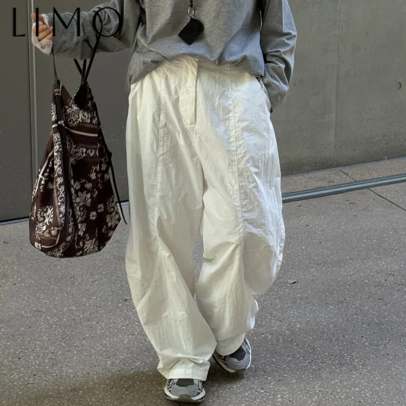 

LIMO Women's Flared Wide Leg Casual Pants Patchwork Buttons Pockets Solid Color Elegant Simple Fashion Spring 2025 Summer