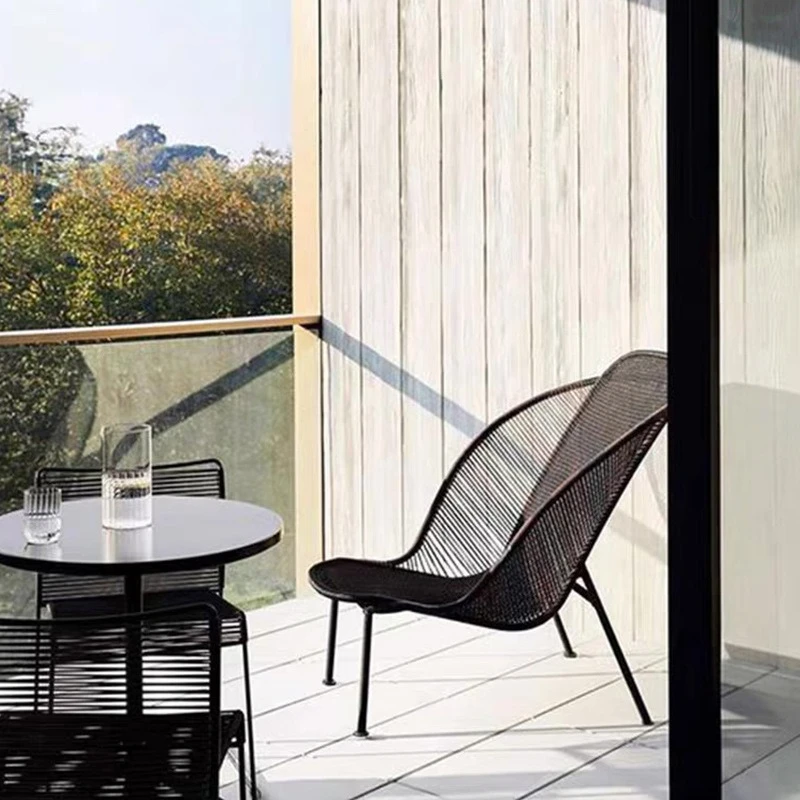 

Nordic outdoor balcony small table and chairs three-piece rattan chair home coffee table Internet celebrity homestay