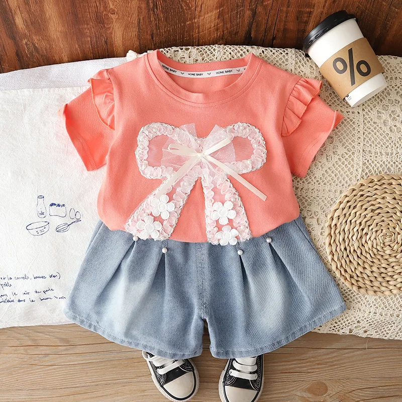 

2026 Summer New Toddler Girls 2pcs Set Lace Bow Ruffle Sleeve T-shirt Denim Skort Kids Sweet Princess Style Casual Outfits