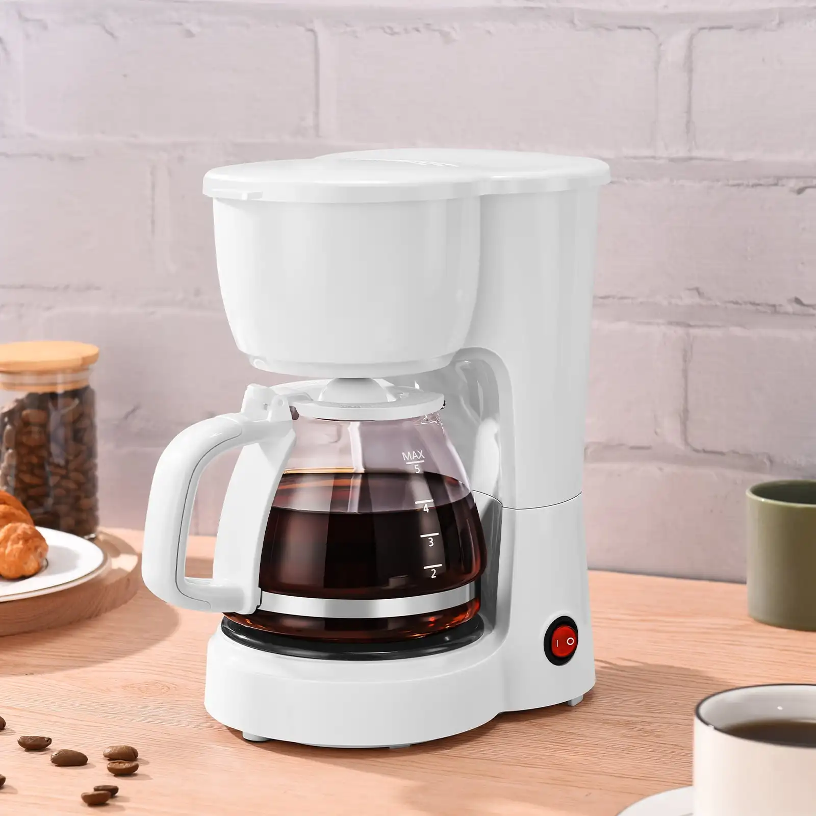 

White 5-Cup Coffee Maker, Perfect for Brewing a Delicious Cup of Coffee in the Morning