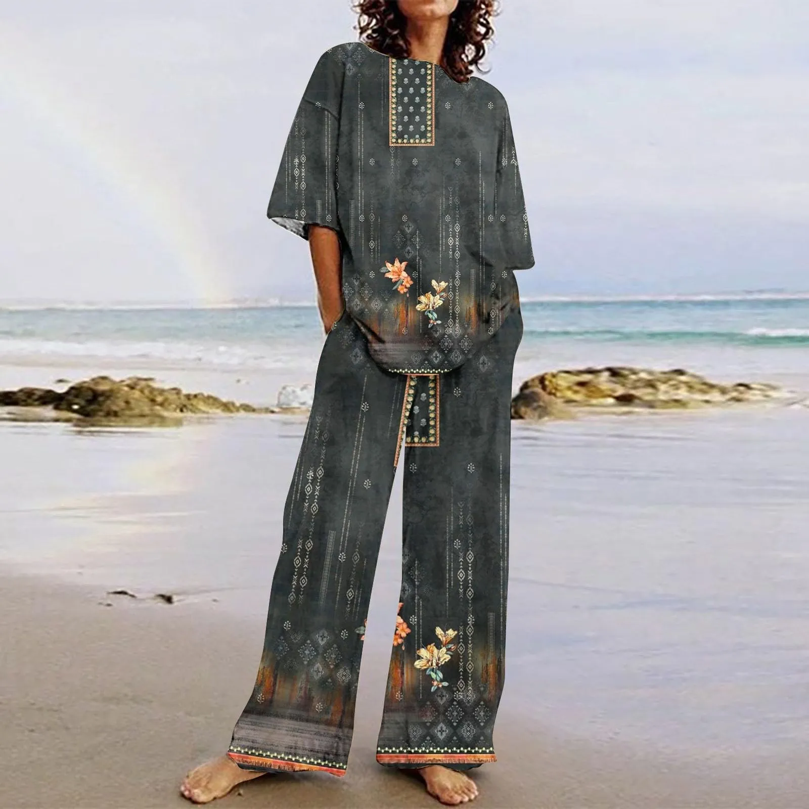 

Women Boho Beach Two Piece Set Fashion Round Neck Short Sleeve Floral Print T Shirt Top With Casual Loose Pocket Pants Suit