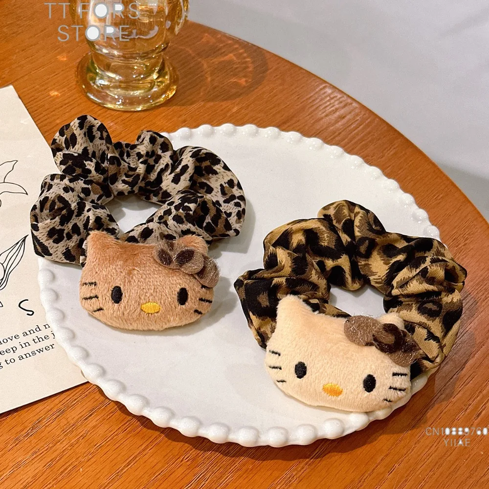 Sanrio Hello Kitty estampado de leopardo pinzas para el cabello y lazos para el cabello de bebé Otoño/Invierno pinzas para el cabello de moda para niña regalos de vacaciones