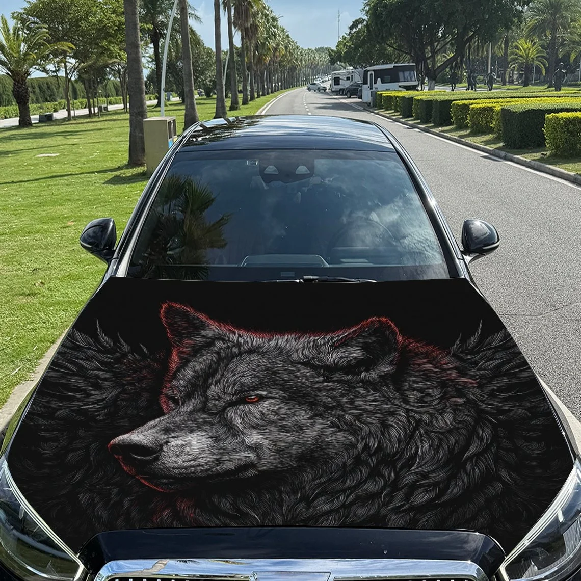 

A striking wolf design on a car hood, featuring detailed fur texture and intense red eyes, perfect for wildlife enthusiasts.