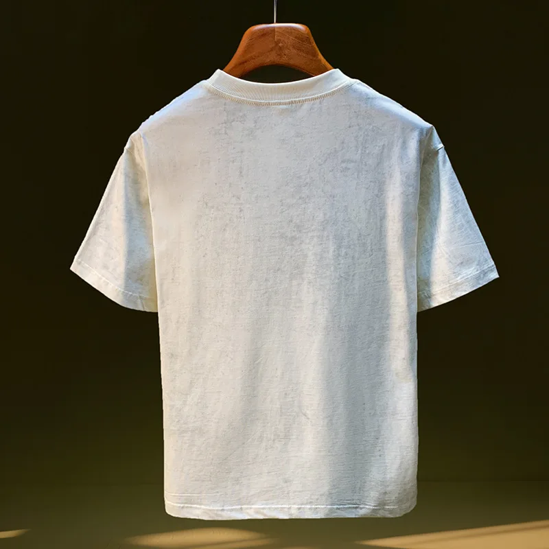 เสื้อยืดแขนสั้นผู้ชายดีไซน์ย้อนยุคแนวโน้มฤดูร้อนหลวมคิดถึงเสื้อเรียบง่ายและทันสมัย