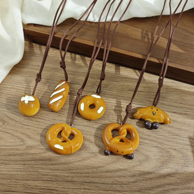 

Casual Style Bagel Pretzel Croissant Necklace For Women Niche Design Cute Pendant Sweater Chain Bag Charm Jewelry Gift