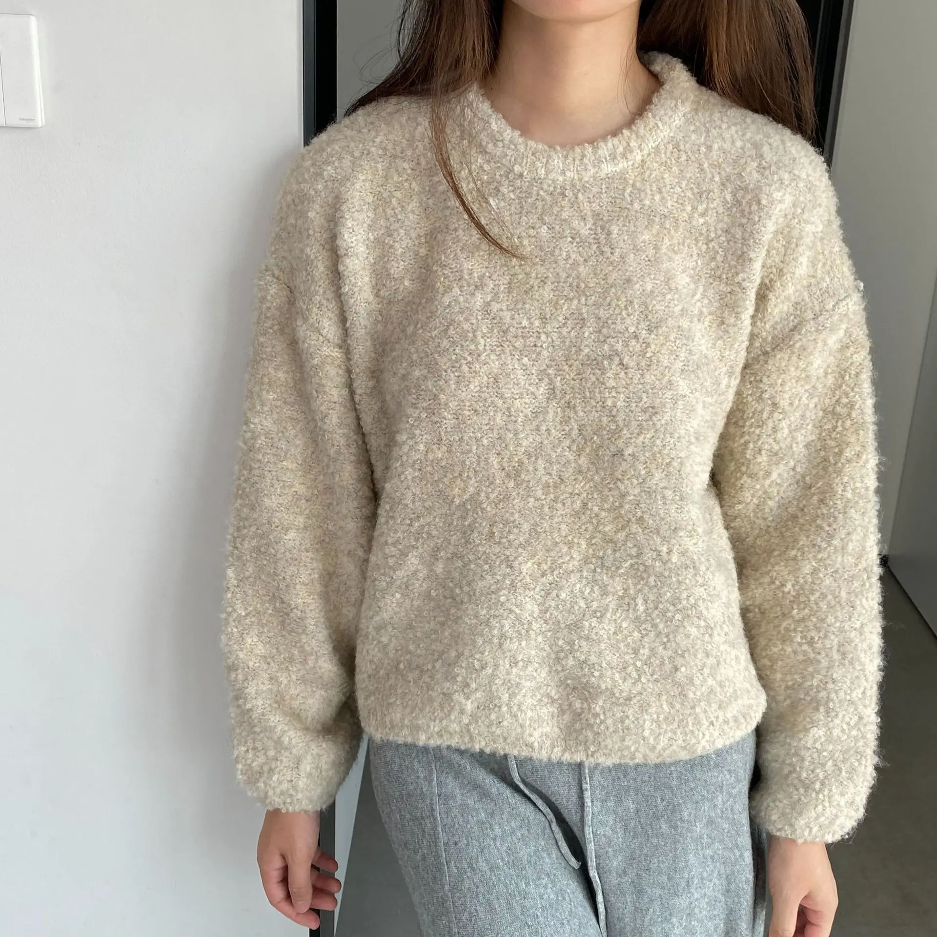 

Autumn and winter women's casual solid color round neck long sleeved loose sweater