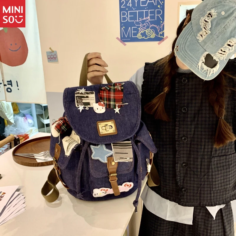 Miniso Nueva mochila Hello Kitty Bone, patchwork de mezclilla desgastado, mochila con bloques de color