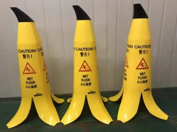 Carefully slide the steps Safety warning  No parking sign Hotel supplies Vertical banana peel cone creative