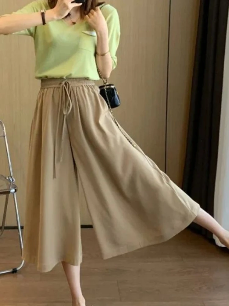 Novedad de verano, pantalones cortos de pierna ancha de seda de hielo para mujer, pantalones sencillos holgados informales finos y cómodos de Color Solic para ir al trabajo