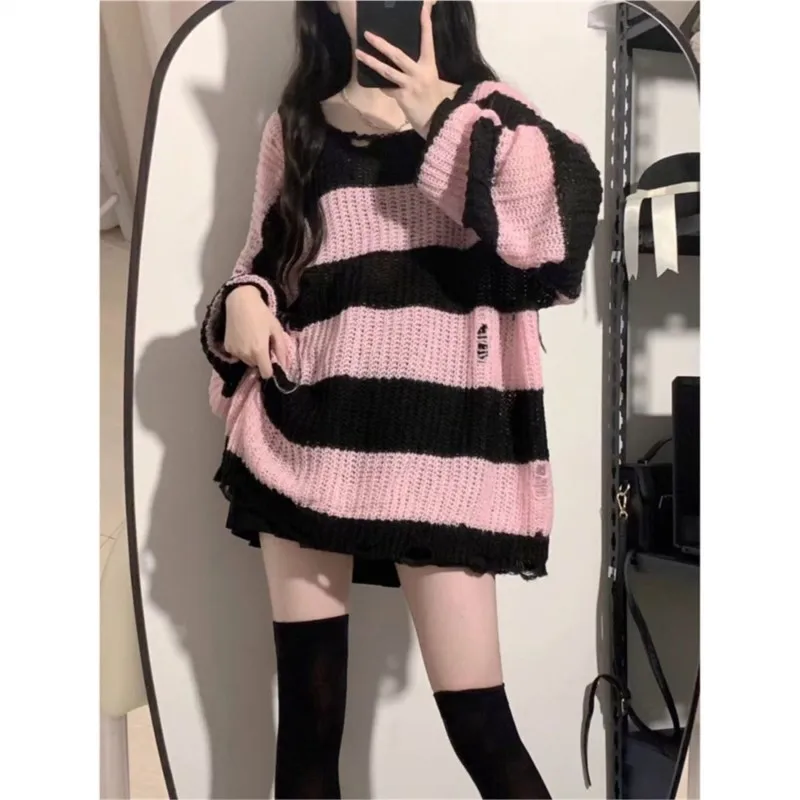 Hole-torn sweater Korean version of striped trend loose pullover wears lazy long sweater in autumn and winter new style.