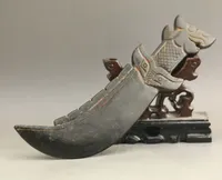 Old natural jade hand-carved statue of dragon axe sword