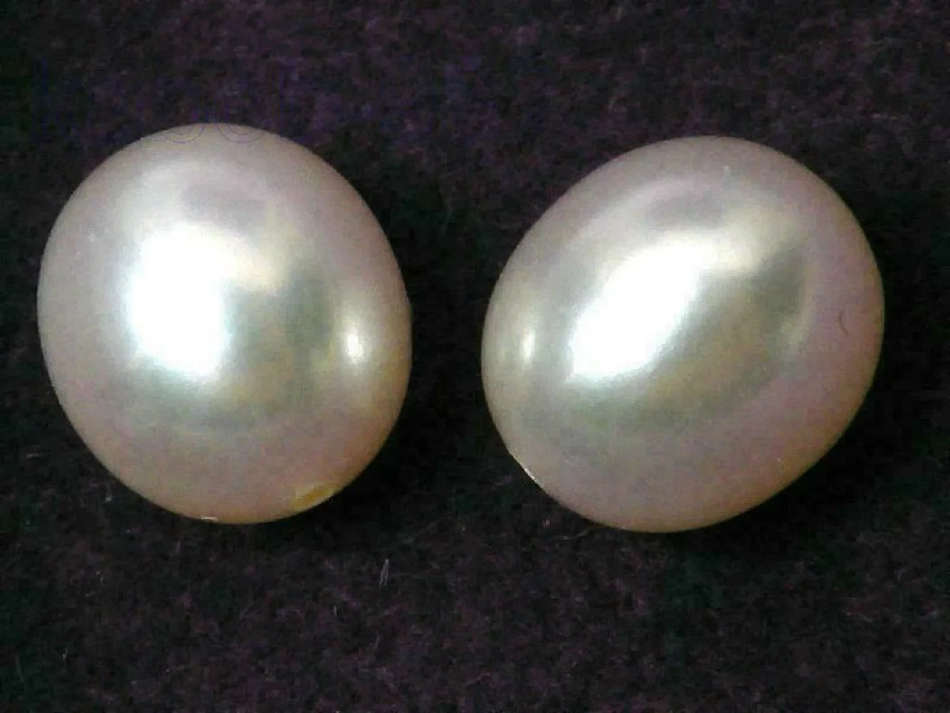 A pair of perfect AAA+7.5-8mm circular bulk gold South Sea pearl half diamonds