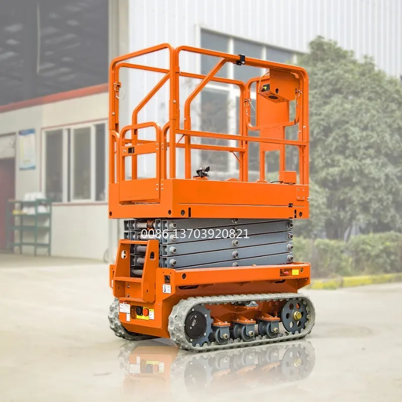Hochwertige Rough Terrain Electric/Diesel Man Lift Raupenbetriebene Raupen-Scherenhebebühne zum günstigen Preis im Angebot