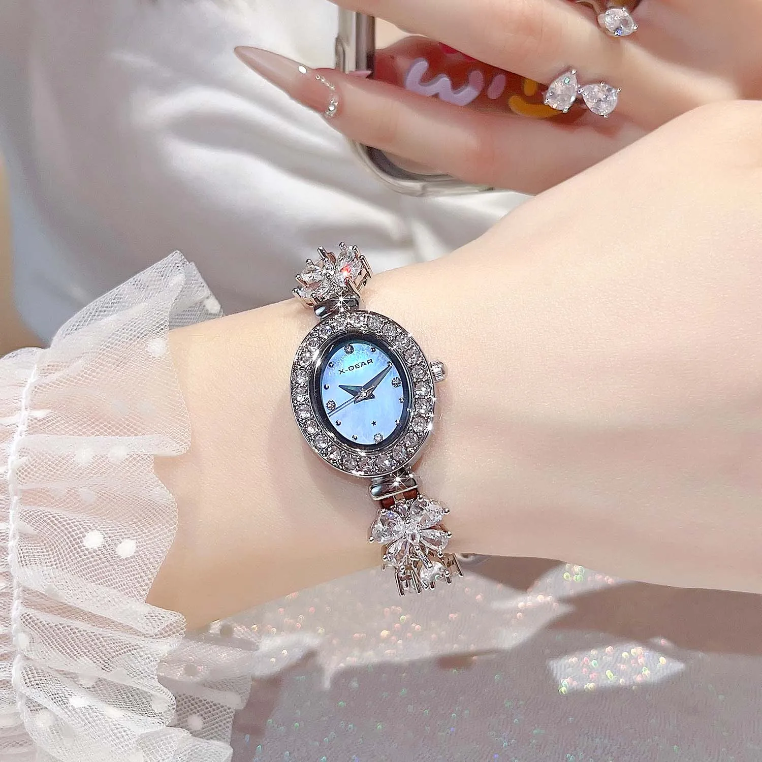 ساعة نسائية كوارتز حركة مقاومة للماء سوار عصري فاخر ساعة ماسية كاملة هدية للفتيات