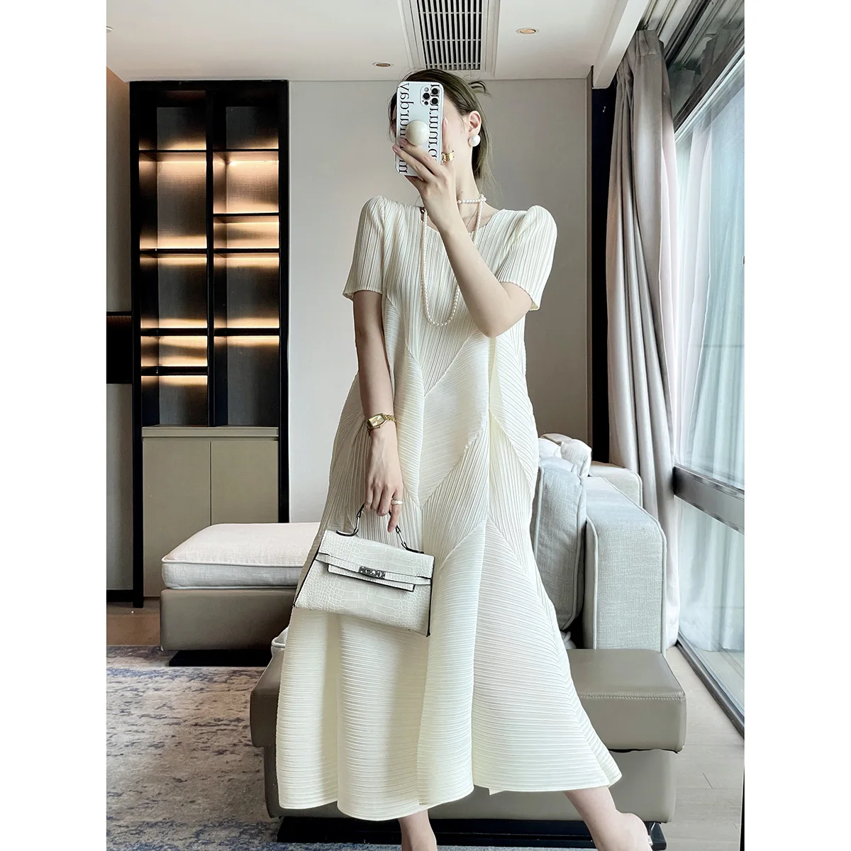 Miyake Fold 2023 Summer New French High End Women's Clothing Elegant and Elegant Dresses Loose Flesh Covering Long Skirt