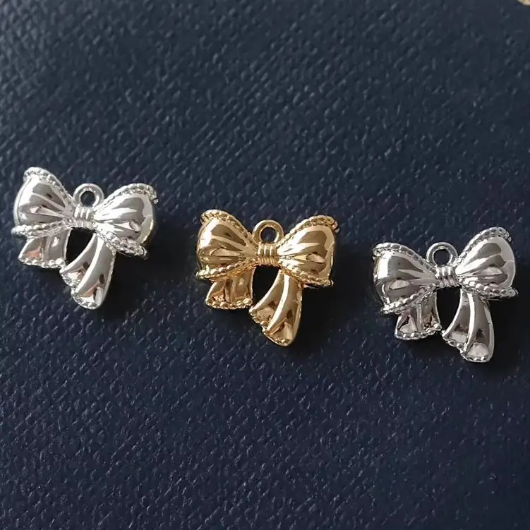 

2PCS 10x11.2mm Mini Bow Pendants Copper-plated Real Gold Sweet Style Exquisite Smooth Surface for DIY Handmade Jewelry Accessory