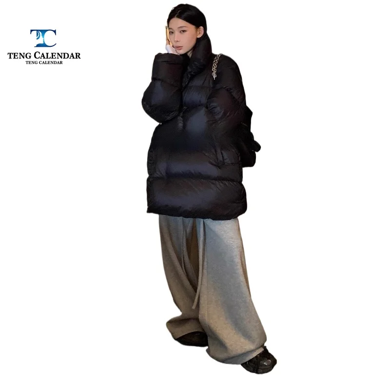 黒のダウンジャケット、ミディアム丈、90%ホワイトダックダウン、厚手で暖かい、多用途、スタンドカラー、ブレッドジャケット、レディース、2025年冬