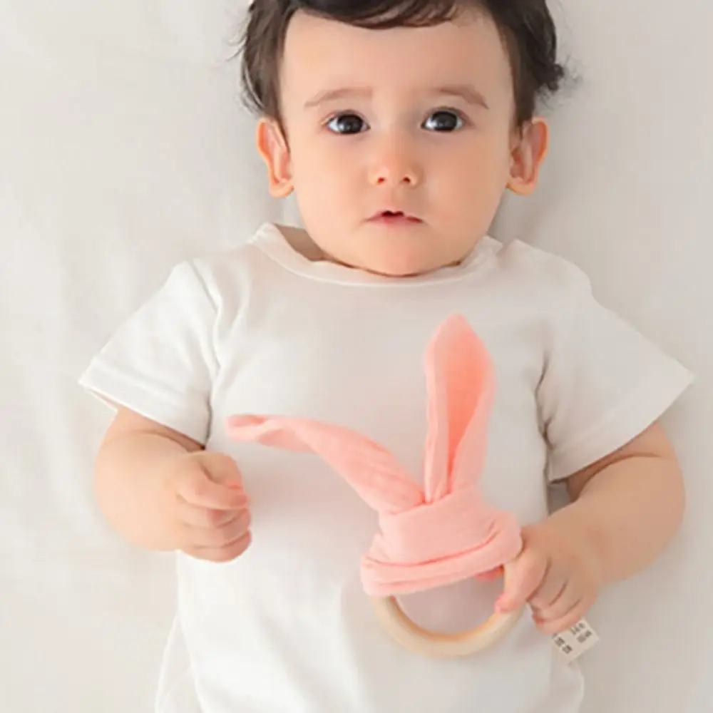 

Soft Baby Wooden Hand Grasp Toy Rabbit Ears Sensory Toy Newborn Teething Ring Natural Wooden Bracelet Rattle Chewing Appease Toy