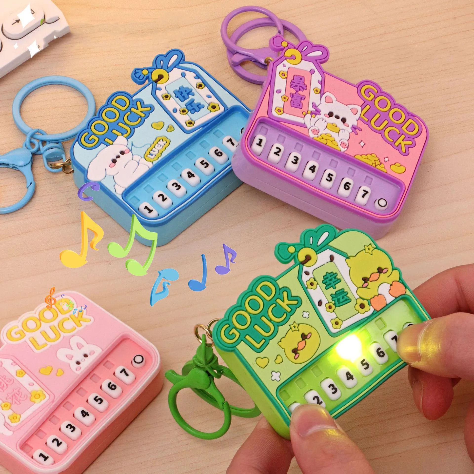 Kreative Cartoon Mini Klavier Schlüsselbund Palm Musik Elektronische Klavier Licht Emittierende Spielzeug Tasche Anhänger Fangen Maschine kinder Spielzeug