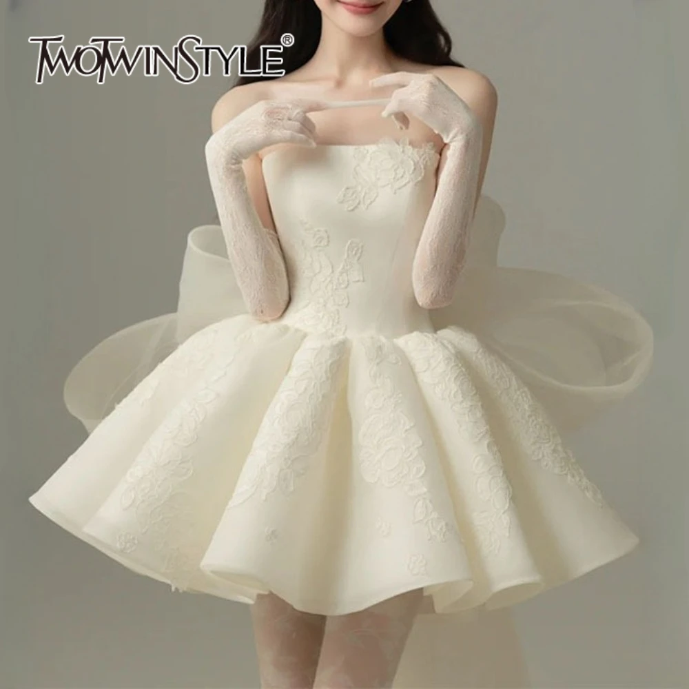 TWOTWINSTYLE solide épissé maille nœud papillon robes douces pour les femmes sans bretelles sans manches taille haute élégant Mini robe femme nouveau