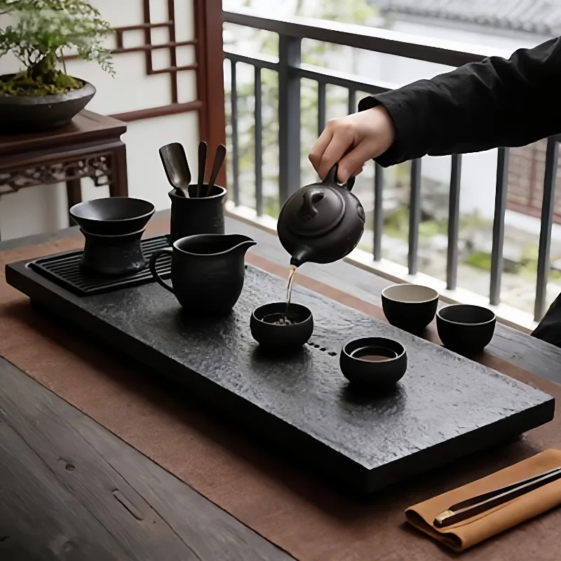 

Natural black stone tea tray whole piece fire stone tea table black stone