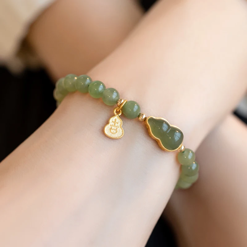 Optimized beaded bracelet for women, featuring a lucky golden gourd with jade inla  in a fresh sweet  and ethnic style