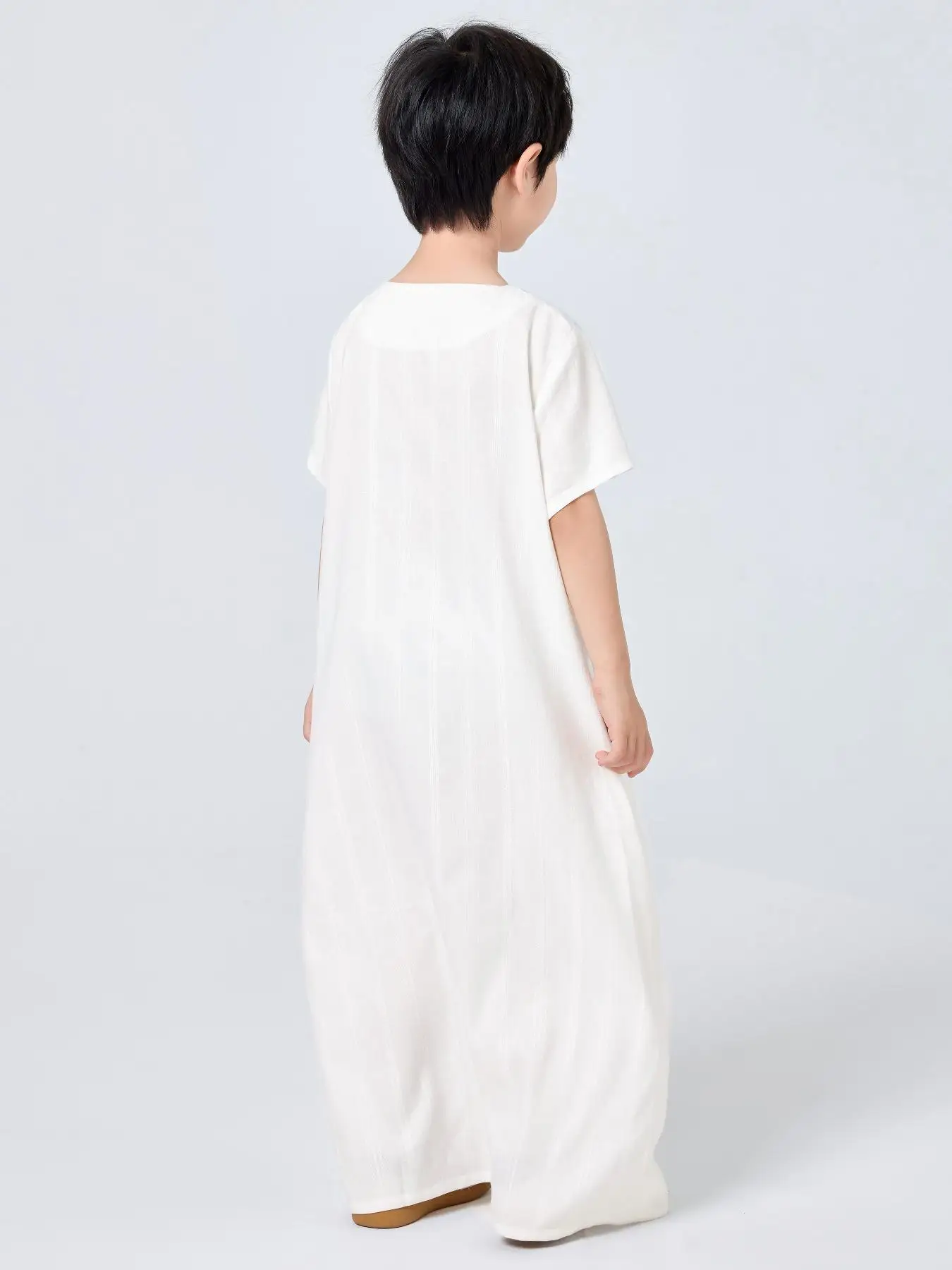 Thobe a maniche corte ricamato da ragazzo in tinta unita turco arabo musulmano mediorientale Dubai