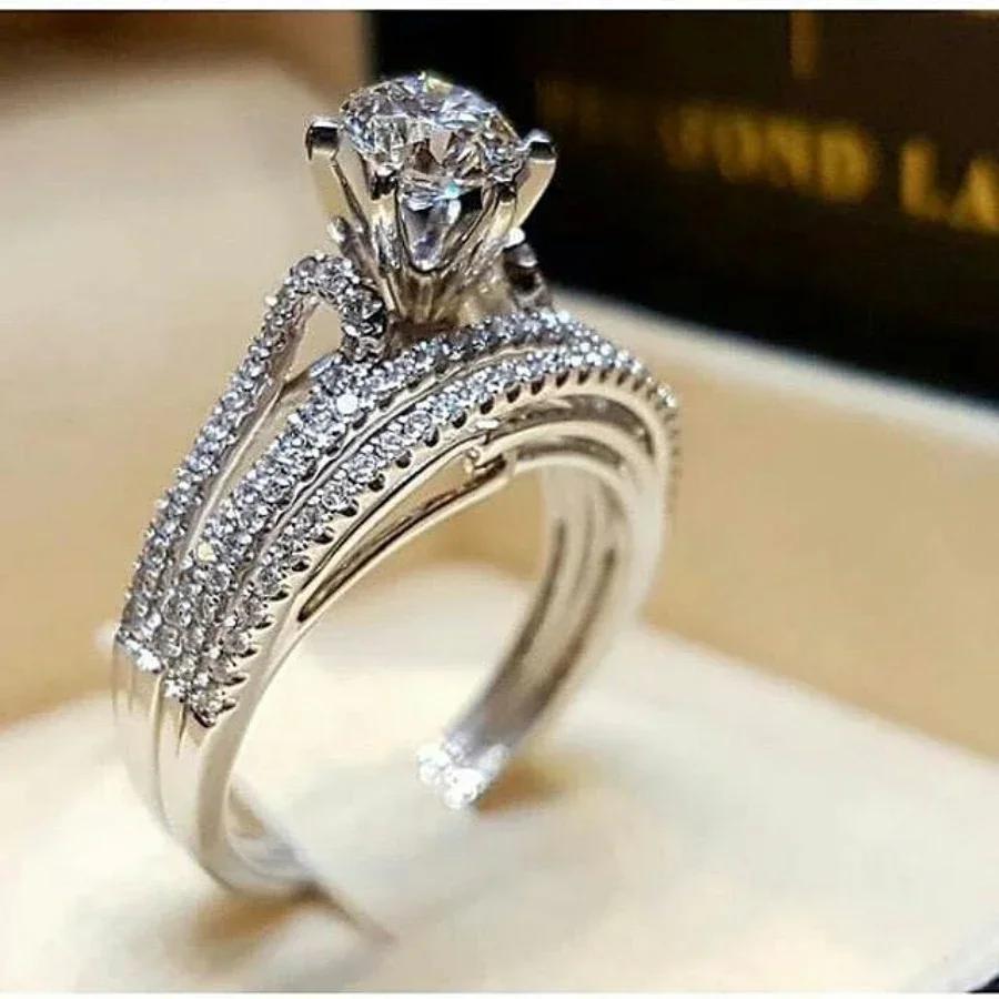 

Elegant 2-Piece Crystal-Studded Wedding Ring Set With Center Stone And Pavé Band