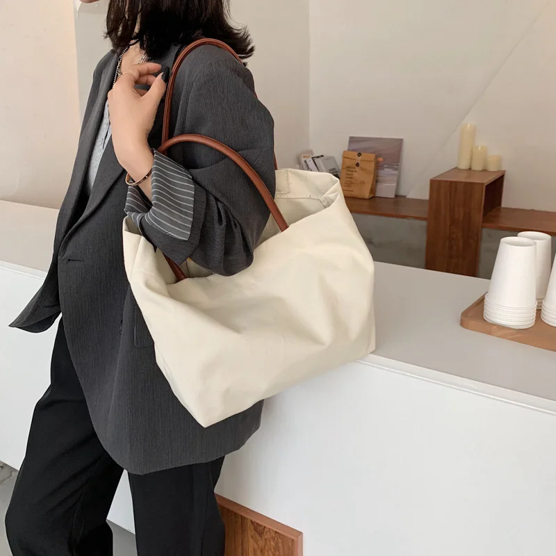 Bolso de lona coreano para mujer, bandolera de gran capacidad con un solo hombro, estilo Simple con cremallera, novedad de 2020