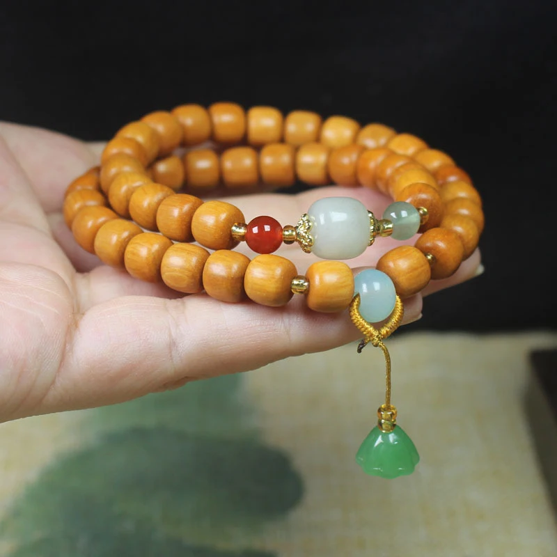 

Браслет из сандалового дерева в винтажном стиле, 8 мм, двухслойный, с подвеской в виде стручка лотоса, унисекс, молитвенные и буддийские бусы.