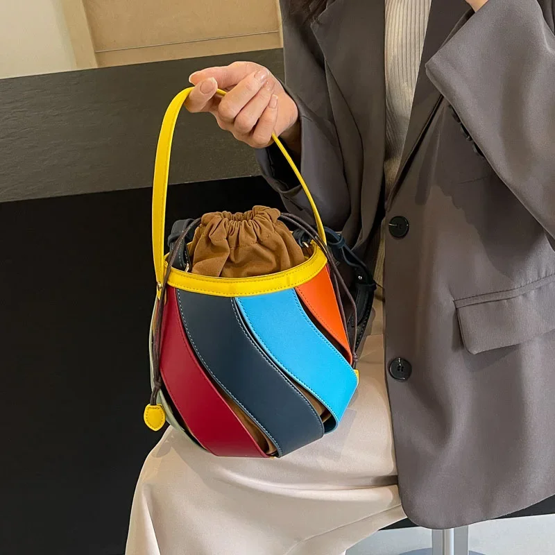 

2025 Women's Rainbow Striped Bucket Bag with Artistic Geometric Patterns Spacious Tote & Crossbody Options for Daily Fashion