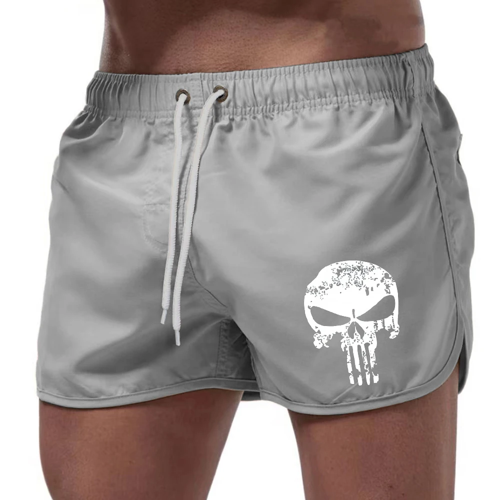 Summer men\'s shorts, fashionable quick drying, breathable surfing, swimming with pockets, men\'s beach pants, printed skull