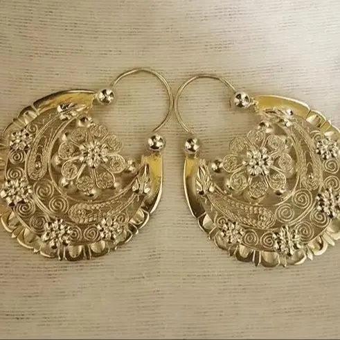 Bohemian Hollow Relief Floral Spiral Copper Jewelry for Ladies' Earrings Is Suitable for Casual and Vacation Outfits.