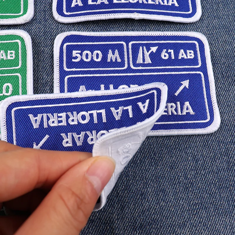 1/2PCS A LLORAR A LA LLORERIA Patch Road Sign Embroidery Patch Iron On Patches For Clothing Jacket Jeans Sew/Ironing Stickers