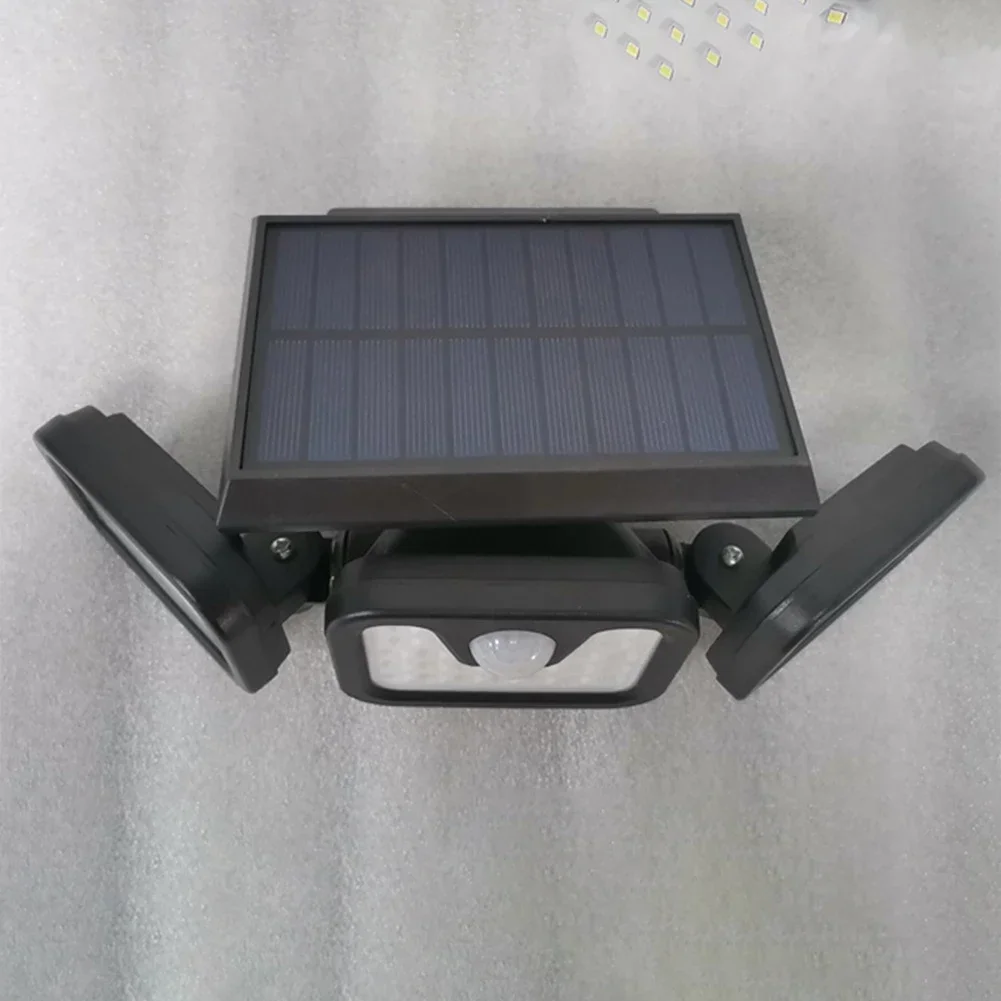 2000LM 74LED พลังงานแสงอาทิตย์กลางแจ้ง Motion Sensor การเหนี่ยวนําของมนุษย์ปรับหัว IP65 กันน้ําโคมไฟติดผนังพลังงานแสงอาทิตย์โคมไฟพลังงานแสงอาทิตย์