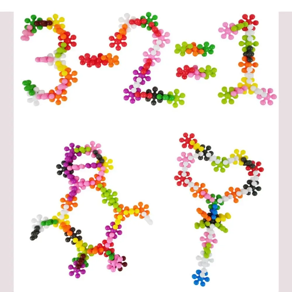컬러풀한 3D 매화꽃 블록 회전 플라스틱 재미있는 조립형 눈송이 조각 삽입형 조기 교육용